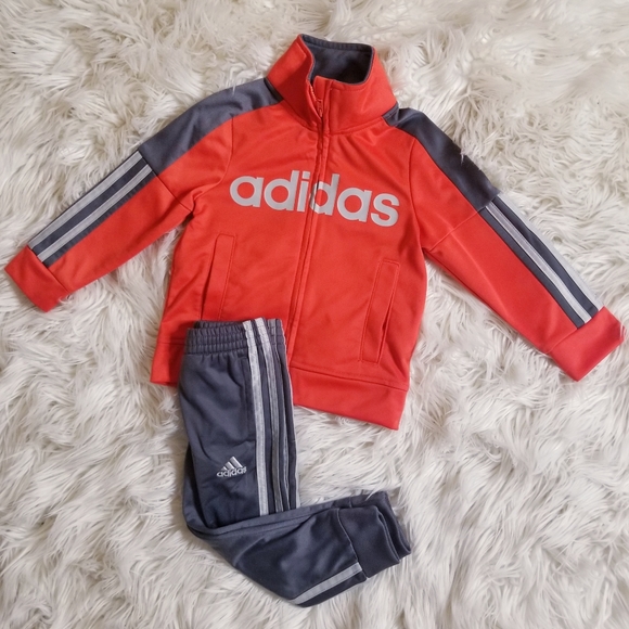 grey and orange adidas tracksuit
